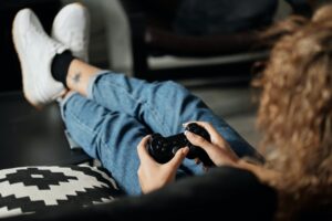 a woman with adhd playing video games as treatment