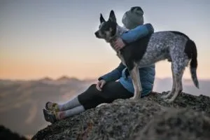 a woman with adhd relieves her stress with her dog by her side