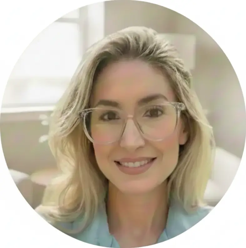GeminiGeneratedImageb3oehvb3oehvb3oe1png | Sachs Center | Sachs Center Portrait of a smiling woman with blonde hair and clear glasses looking at the camera in a bright neutral setting within a circular crop